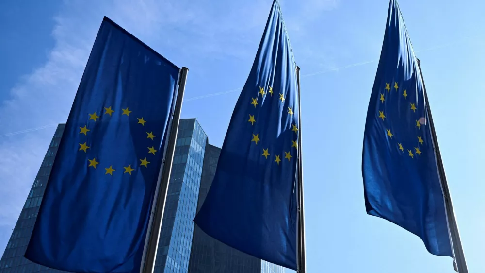 FILE PHOTO: European Union flags flutter outside the European Central Bank (ECB) headquarters in Frankfurt, Germany, March 19, 2026. REUTERS/Jana Rodenbusch/File Photo