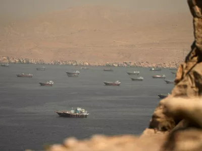 FILE PHOTO: Vessels at the Strait of Hormuz, as seen from Musandam, Oman, June 18, 2026. REUTERS/Stringer/File Photo