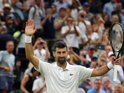 Tennis - Wimbledon - All England Lawn Tennis and Croquet Club, London, Britain - July 1, 2026 Serbia's Novak Djokovic celebrates after winning his second round match against Greece's Stefanos Tsitsipas REUTERS/Marko Djurica