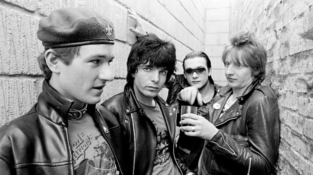 Captain Sensible (aka Raymond Burns), Brian James, Dave Vanian and Rat Scabies of punk band The Damned pose for a group portrait in Spring 1977 in Copenhagen, Denmark. (Photo by Jorgen Angel/Redferns)