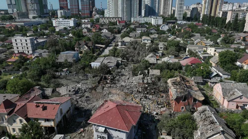 A drone view shows private houses damaged and destroyed during overnight Russian missile and drone strikes, amid Russia's attack on Ukraine, in Kyiv Ukraine July 2, 2026. REUTERS/Valentyn Ogirenko