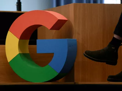 FILE PHOTO: A Google sign is pictured during the company's presentation of a detailed investment plan for Germany outside the Google office in Berlin, Germany, August 31, 2021. REUTERS/Annegret Hilse/File Photo