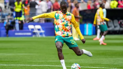 Senegal's Pape Gueye (26) warms up during the World Cup round of 32 soccer match between Belgium and Senegal in Seattle, Wednesday, July 1, 2026. (AP Photo/Ted S. Warren)