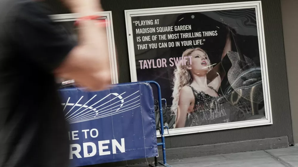 Signage depicting Taylor Swift outside Madison Square Garden, ahead of a reported wedding between singer Taylor Swift and National Football League player Travis Kelce, in New York City, U.S., July 1, 2026. REUTERS/Bing Guan
