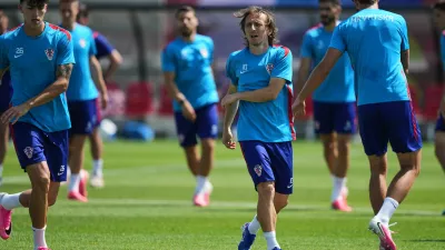 Croatia's Luka Modric, second from right, works out, during a training session on the eve of the team's World Cup soccer match against Portugal, Wednesday, July 1, 2026, in Toronto, Canada. (AP Photo/Stephanie Scarbrough)