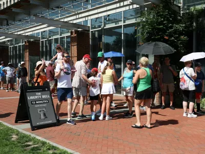 People wait in line to view the Liberty Bell at Independence National Historical Park amid a heatwave in Philadelphia, Pennsylvania, U.S., July 2, 2026. REUTERS/Hannah Beier