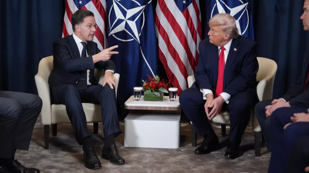 President Donald Trump, right, meets with NATO Secretary General Mark Rutte during a meeting on the sidelines of the Annual Meeting of the World Economic Forum in Davos, Switzerland, Wednesday, Jan. 21, 2026. (AP Photo/Evan Vucci)