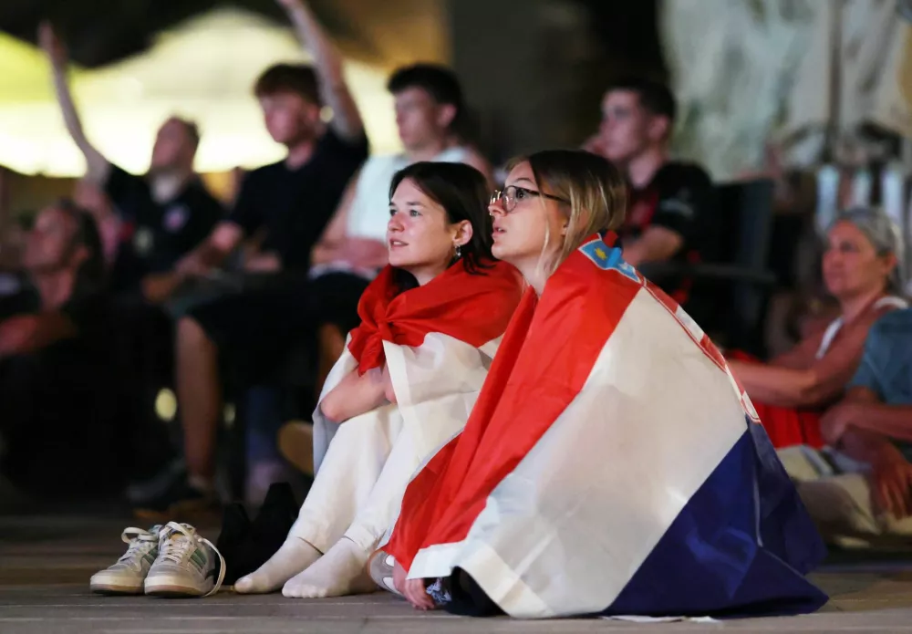 Soccer Football - FIFA World Cup 2026 - Round of 32 - Portugal v Croatia - Fans gather in Rab - Rab, Croatia - July 3, 2026 Croatia fans in Rab watch the match REUTERS/Antonio Bronic