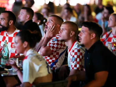 Soccer Football - FIFA World Cup 2026 - Round of 32 - Portugal v Croatia - Fans gather in Rab - Rab, Croatia - July 3, 2026 Croatia fans in Rab react to the match REUTERS/Antonio Bronic