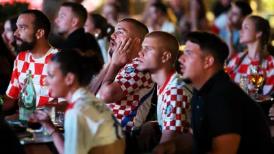 Soccer Football - FIFA World Cup 2026 - Round of 32 - Portugal v Croatia - Fans gather in Rab - Rab, Croatia - July 3, 2026 Croatia fans in Rab react to the match REUTERS/Antonio Bronic