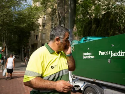 Antonio Reina, a worker, wears a heat-monitoring bracelet and wipes the sweat off while working. A year after one of its street cleaners died during a heatwave, the city of Barcelona has begun to use heat-monitoring bracelets for its outdoor workers to help prevent heat-related incidents in Barcelona, Spain, July 1, 2026. REUTERS/ Bruna Casas
