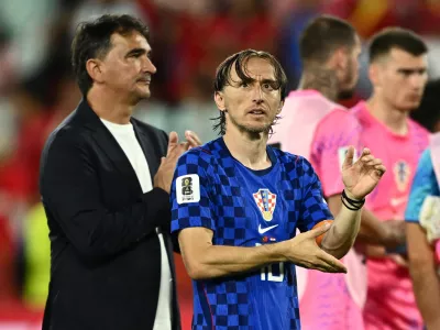Soccer Football - FIFA World Cup 2026 - Round of 32 - Portugal v Croatia - Toronto Stadium, Toronto, Canada - July 2, 2026 Croatia's Luka Modric and coach Zlatko Dalic look dejected after the match as Croatia are eliminated from the World Cup REUTERS/Dylan Martinez