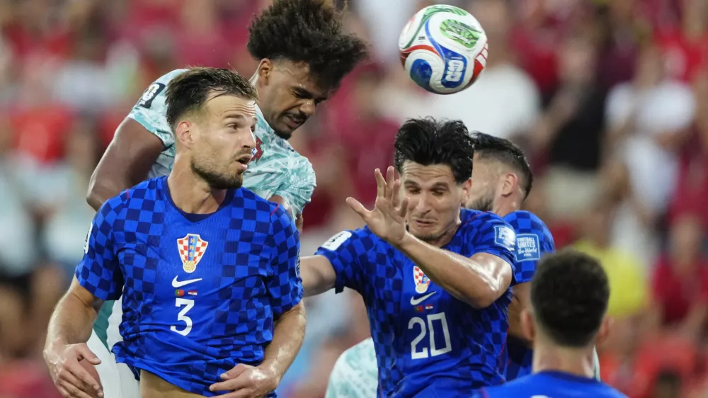 Soccer Football - FIFA World Cup 2026 - Round of 32 - Portugal v Croatia - Toronto Stadium, Toronto, Canada - July 2, 2026 Croatia's Marin Pongracic and Croatia's Igor Matanovic in action with Portugal's Renato Veiga IMAGN IMAGES via Reuters/Kevin Sousa