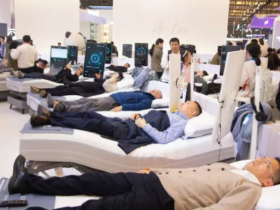 Fairgoers visit the Shufude AI sleeping mattress booth during the second day of the AWE 2026 trade fair at SNIEC in Shanghai, China, on March 13, 2026.AWE 2026 Trade Fair In Shanghai, China - 13 Mar 2026,Image: 1082656071, License: Rights-managed, Restrictions:, Model Release: no 
