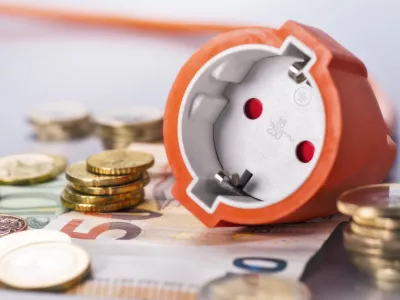 Socket with coins and banknotes