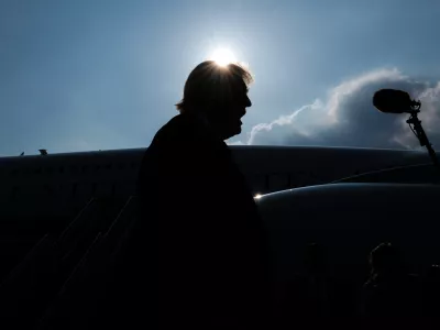 President Donald Trump speaks with reporters before boarding the new Air Force One, Wednesday, July 1, 2026, at Joint Base Andrews, Md. (AP Photo/Julia Demaree Nikhinson)