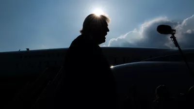 President Donald Trump speaks with reporters before boarding the new Air Force One, Wednesday, July 1, 2026, at Joint Base Andrews, Md. (AP Photo/Julia Demaree Nikhinson)