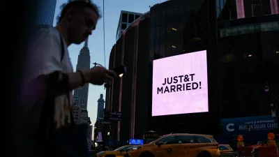 A screen displays a message referencing singer Taylor Swift and National Football League (NFL) player Travis Kelce outside Madison Square Garden, the venue for their reported wedding celebrations, in New York, U.S., July 3, 2026. REUTERS/Angelina Katsanis