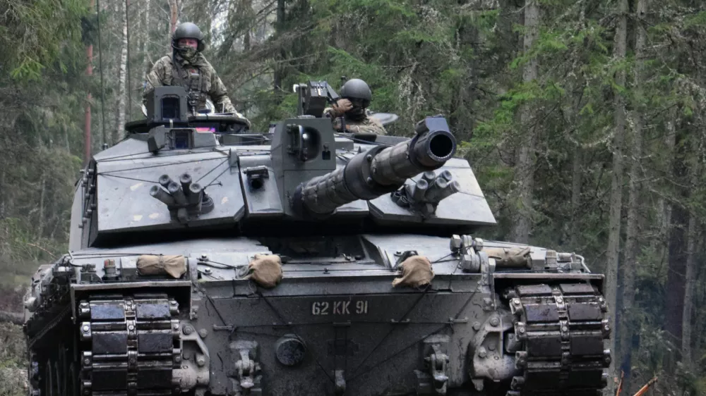 Pictured are The Queens Royal Hussars (QRH), Challenger 2s, about to breach Abatus, an obstacle formed from felled trees during a training exercise.This type of obstacle is designed to slow and even halt advancing vehicles. The Queens Royal Hussars (QRH), eFP BG operated the Challenger two's and navigated the obstructions with ease whilst deployed on Operation CABRIT in Estonia as part of the NATO enhanced Forward Presence. The Challenger 2 is a main battle tank, designed to destroy other tanks. It has been used by the British Army on operations in Bosnia and Herzegovina, Kosovo and Iraq, and has never experienced a loss at the hands of the enemy. Built in the UK by Vickers Defence Systems, now BAE Systems and Land Armaments, it was designed as a replacement to the Challenger 1 tank in 1986 and has been in service with the British Army since July 1994.