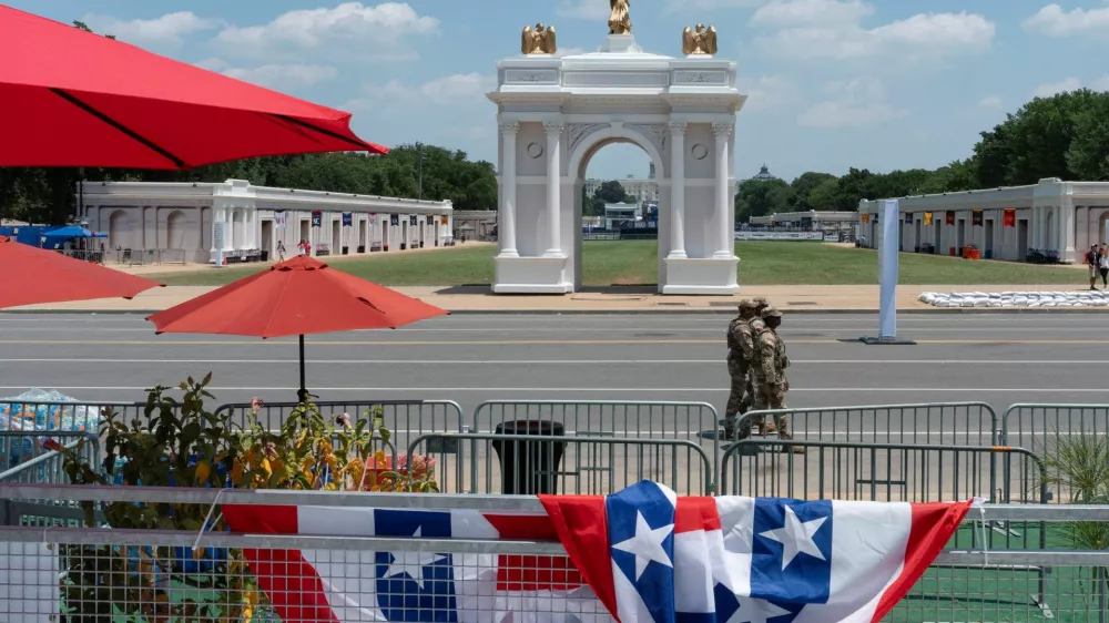 National Guard members patrol the National Mall in Washington, D.C., U.S., after the Great American State Fair was temporarily closed due to heat, July 3, 2026. REUTERS/Cheney Orr