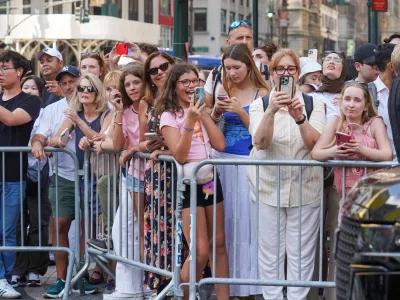 Fans line up outside of Madison Square Garden ahead of a reported wedding between singer Taylor Swift and National Football League player Travis Kelce on Friday, July 3, 2026, in New York. (AP Photo/Ryan Murphy)