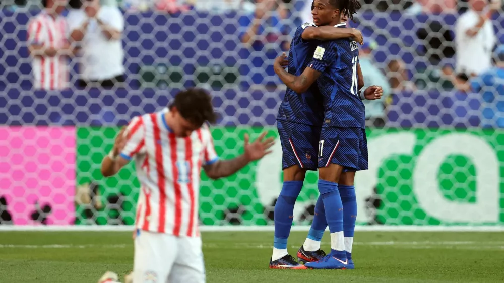 Soccer Football - FIFA World Cup 2026 - Round of 16 - Paraguay v France - Philadelphia Stadium, Philadelphia, Pennsylvania, U.S. - July 4, 2026 France's Michael Olise and Kylian Mbappe celebrate after the match IMAGN IMAGES via Reuters/Bill Streicher