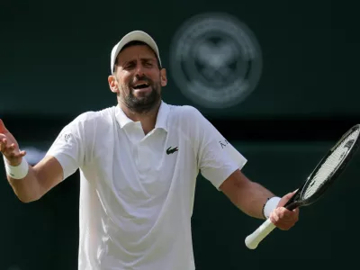 Tennis - Wimbledon - All England Lawn Tennis and Croquet Club, London, Britain - July 5, 2026 Serbia's Novak Djokovic reacts during his fourth round match against Russia's Roman Safiullin REUTERS/Marko Djurica