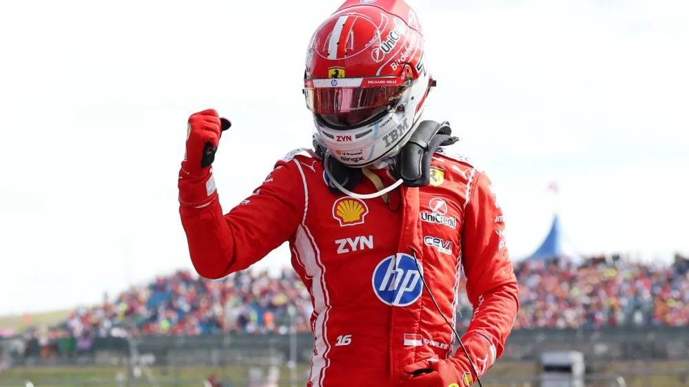 Formula One F1 - British Grand Prix - Silverstone Circuit, Silverstone, Britain - July 5, 2026 Ferrari's Charles Leclerc celebrates after winning the British Grand Prix REUTERS/Suzanne Plunkett   TPX IMAGES OF THE DAY