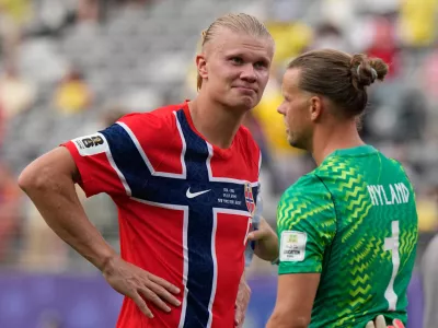Norway's Erling Haaland (9) and Norway goalkeeper Oerjan Nyland (1) celebrate after the World Cup round of 16 soccer match between Brazil and Norway in East Rutherford, N.J., near New York, Sunday, July 5, 2026. (AP Photo/Frank Franklin II)
