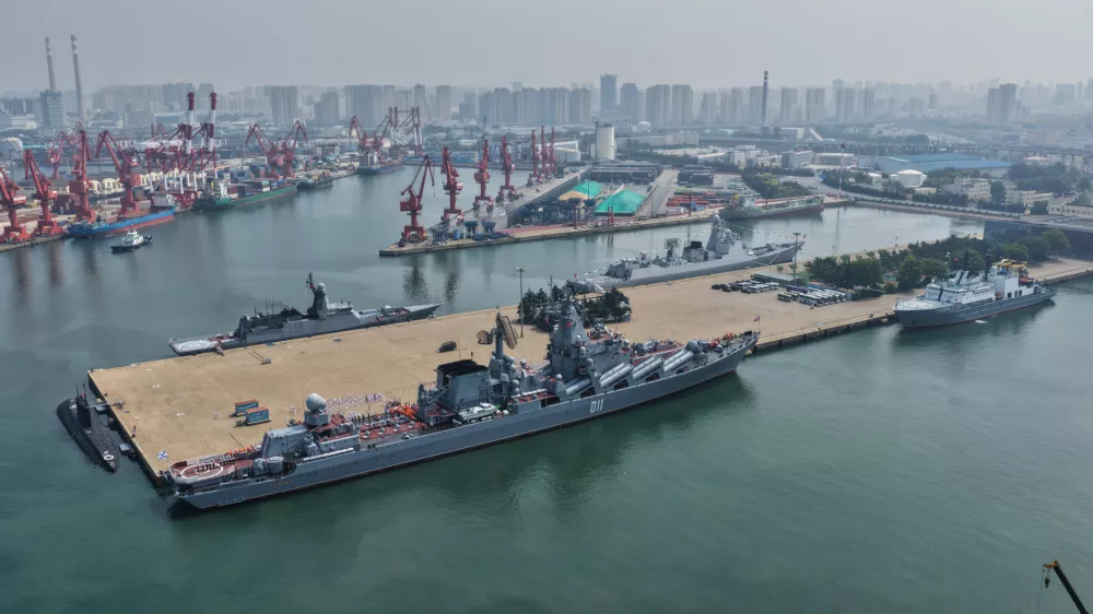 In this photo released by Xinhua News Agency, Russian naval fleets dock at a military port in Qingdao, east China's Shandong Province, to participate in the "Joint Sea-2026" naval exercise with China on Sunday, July 5, 2026. (Li Fengxiang/Xinhua via AP)