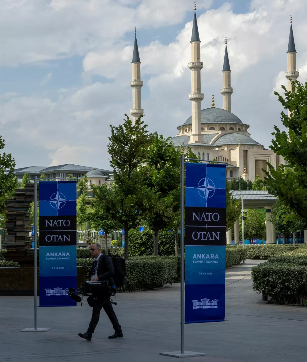 A member of the media walks inside the Presidential Palace complex a day before the start of the NATO Summit in Ankara, Turkey, July 6, 2026. REUTERS/Umit Bektas