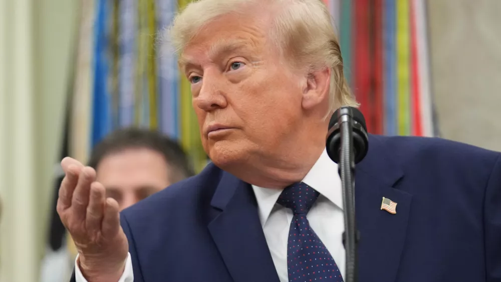 President Donald Trump speaks after ringing the opening bell for the New York Stock Exchange and the Nasdaq in the Oval Office at the White House, Monday, July 6, 2026, in Washington. (AP Photo/Mark Schiefelbein)