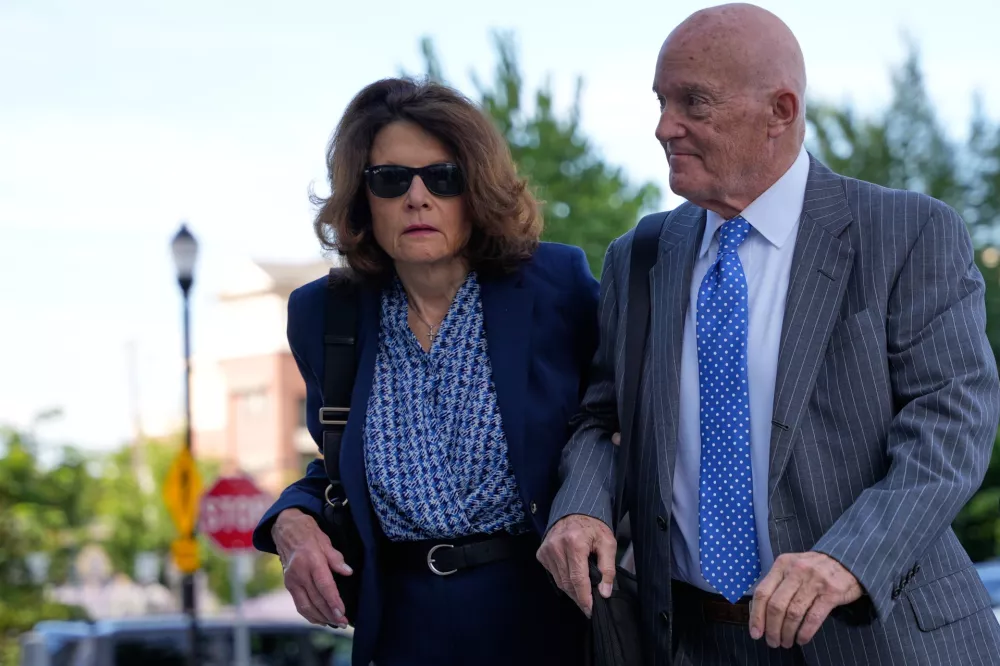 Charlie Kirk's parents, Robert and Kathryn Kirk, arrive at the Fourth District Courthouse for a hearing for Tyler Robinson, accused in the fatal shooting of Charlie Kirk, Monday, July 6, 2026, in Provo, Utah. (AP Photo/Marielle Scott)