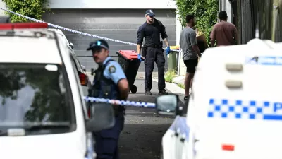 Police officers work at a crime scene at Waite Road in Paddington, Sydney, Australia February 23, 2024. A Sydney police officer has been charged on Friday for the alleged murder of two men who have been missing since earlier this week. AAP Image/Dean Lewins via REUTERS ATTENTION EDITORS - THIS IMAGE WAS PROVIDED BY A THIRD PARTY. AUSTRALIA OUT. NO COMMERCIAL OR EDITORIAL SALES IN AUSTRALIA. NEW ZEALAND OUT. NO COMMERCIAL OR EDITORIAL SALES IN NEW ZEALAND. NO RESALES. NO ARCHIVE