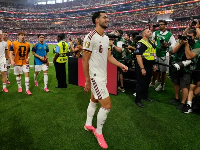 Spain's scorer Mikel Merino (6)leaves the pitch after winning the World Cup round of 16 soccer match between Portugal and Spain in Arlington, Texas, near Dallas, Monday, July 6, 2026. (AP Photo/Tony Gutierrez)