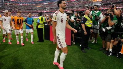 Spain's scorer Mikel Merino (6)leaves the pitch after winning the World Cup round of 16 soccer match between Portugal and Spain in Arlington, Texas, near Dallas, Monday, July 6, 2026. (AP Photo/Tony Gutierrez)