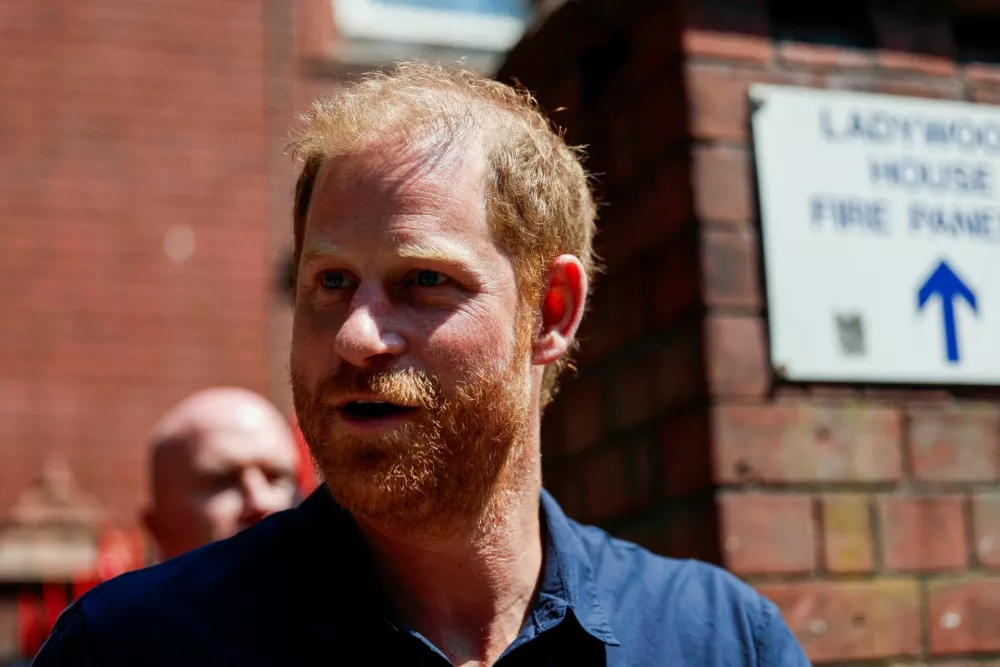 Britain's Prince Harry leaves the Birmingham Children's Hospital after celebrating the 20th anniversary of the first WellChild Nurse programme, in Birmingham, Britain, July 9, 2026. REUTERS/Lisa Leutner