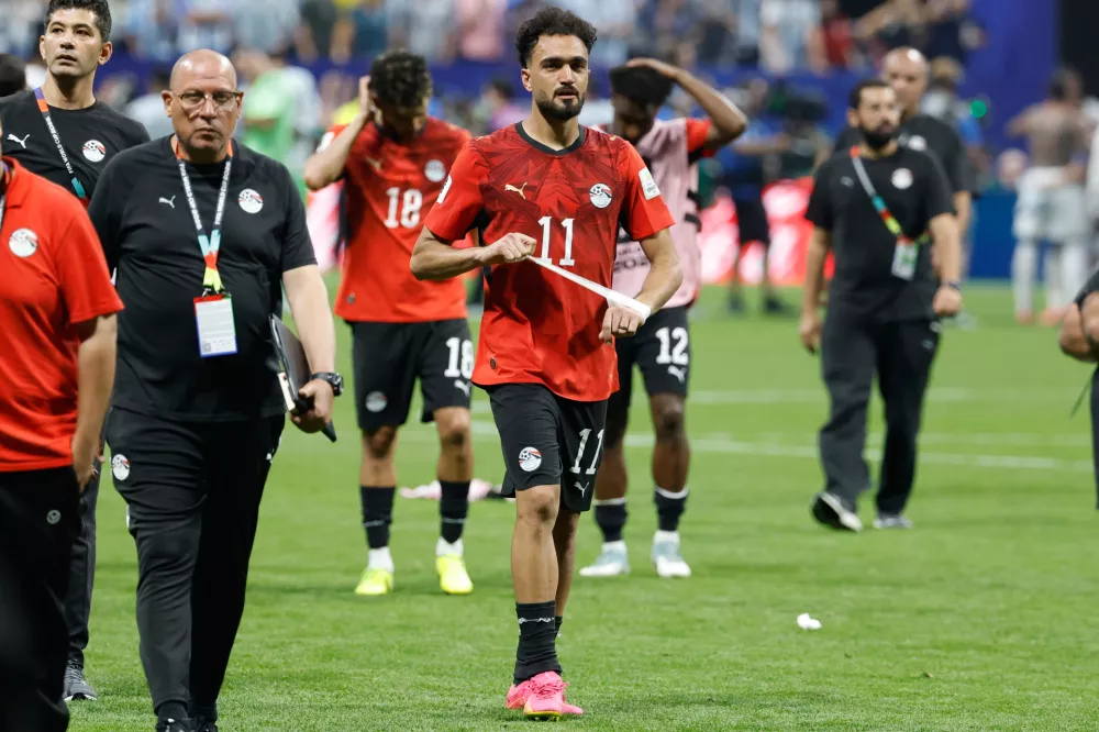 Egypt's Mostafa Zico (11) walks off the pitch after the World Cup round of 16 soccer match between Argentina and Egypt in Atlanta, Tuesday, July 7, 2026. (AP Photo/Erik S. Lesser)