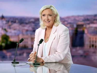 FILE PHOTO: French far-right leader Marine Le Pen, member of parliament for the Rassemblement National (National Rally - RN) party, poses prior to an interview on the evening news broadcast of French TV channel TF1, following the verdict in her appeal trial over misuse of EU funds, in Boulogne-Billancourt, near Paris, France, July 7, 2026. REUTERS/Christian Hartmann/Pool   TPX IMAGES OF THE DAY/File Photo