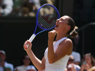 Tennis - Wimbledon - All England Lawn Tennis and Croquet Club, London, Britain - July 8, 2026 Ukraine's Marta Kostyuk celebrates after winning her quarter final match against Italy's Jasmine Paolini REUTERS/Marko Djurica