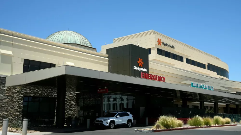 Mercy Gilbert Medical Center, shown here, where an 18-month-old toddler discovered in a backyard pool and taken to the hospital in February, was declared dead before being found breathing hours later in a room that serves as the hospital morgue, according to recently released police records, Monday, July 6, 2026, in Gilbert, Ariz. (AP Photo/Ross D. Franklin)