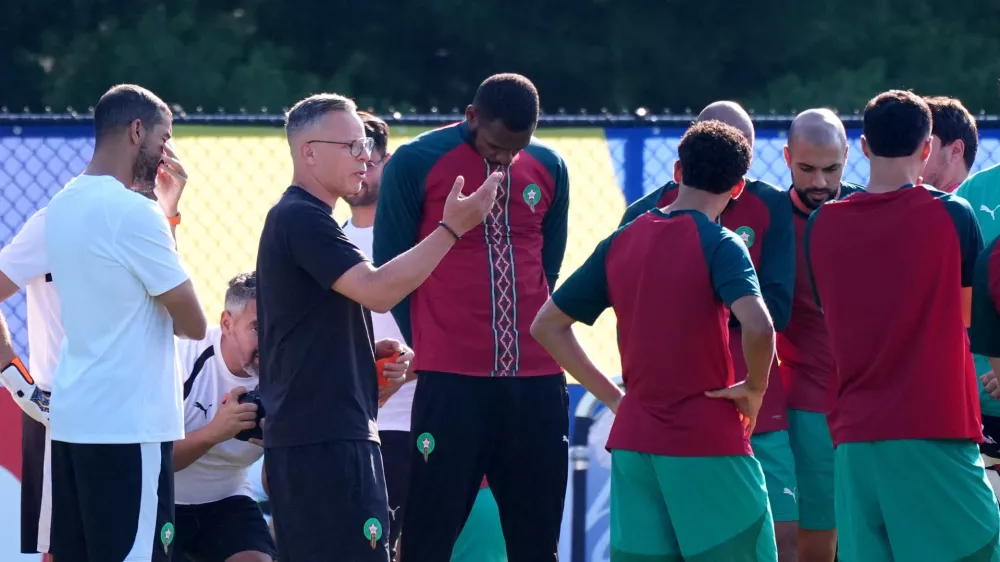 Soccer Football - FIFA World Cup 2026 - Morocco Training - New England Revolution Training Centre, Foxborough, Massachusetts, U.S. - July 8, 2026 Morocco coach Mohamed Ouahbi with players during training IMAGN IMAGES via Reuters/David Butler Ii