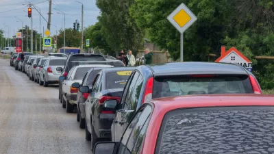 Cars queue on a road for fuel at a gas station after authorities restricted fuel sales amid a supply shortage following Ukrainian attacks on logistics routes in the course of Russia-Ukraine conflict, in the Black Sea resort city of Yevpatoriya, Crimea, June 3, 2026. REUTERS/Alexey Pavlishak