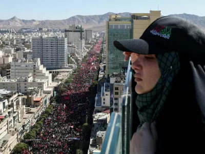 A woman looks on, as mourners gather on the day of the burial of Iran's late Supreme Leader Ayatollah Ali Khamenei, who was killed on February 28 in Israeli and U.S. airstrikes, in Mashhad, Iran, July 9, 2026. REUTERS/Mohammed Salem Foreign media in Iran operate under guidelines set by the Ministry of Culture and Islamic Guidance, which regulates press activity and permissions.  ISRAEL OUT. NO COMMERCIAL OR EDITORIAL SALES IN ISRAEL. NO ACCESS FOR ISRAELI MEDIA. NO USE BBC PERSIAN. NO USE VOA PERSIAN. NO USE MANOTO. NO USE IRAN INTERNATIONAL. NO USE RADIO FARDA. DIGITAL: NO USE BBC PERSIAN. NO USE VOA PERSIAN. NO USE MANOTO. NO USE IRAN INTERNATIONAL. NO USE RADIO FARDA.