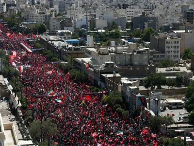 Mourners attend the burial ceremony for Iran's late Supreme Leader Ayatollah Ali Khamenei, who was killed on February 28 in Israeli and U.S. airstrikes, in Mashhad, Iran, July 9, 2026. Majid Asgaripour/WANA (West Asia News Agency) via REUTERS  ATTENTION EDITORS - THIS PICTURE WAS PROVIDED BY A THIRD PARTY. ISRAEL OUT. NO COMMERCIAL OR EDITORIAL SALES IN ISRAEL. NO ACCESS FOR ISRAELI MEDIA. NO USE BBC PERSIAN. NO USE VOA PERSIAN. NO USE MANOTO. NO USE IRAN INTERNATIONAL. NO USE RADIO FARDA. DIGITAL: NO USE BBC PERSIAN. NO USE VOA PERSIAN. NO USE MANOTO. NO USE IRAN INTERNATIONAL. NO USE RADIO FARDA