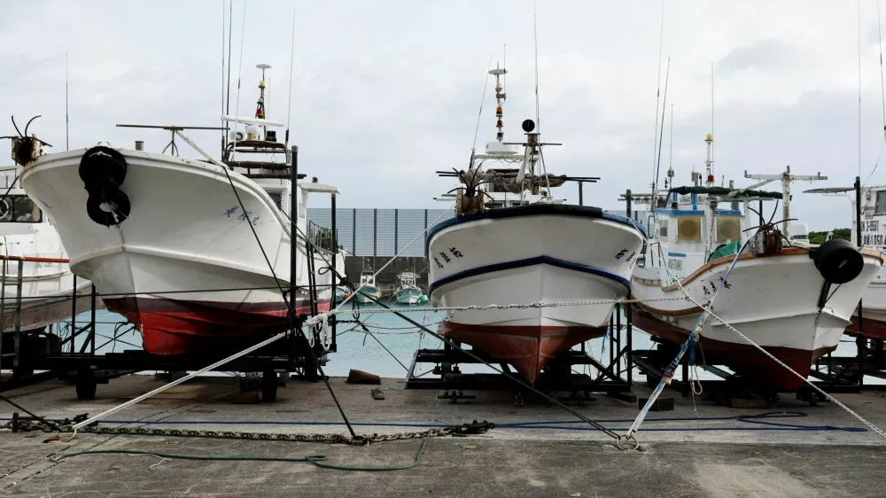 Fishing boats are tied to a pier as Typhoon Bavi approaches, in Ishigaki, Japan, July 9, 2026. REUTERS/Kim Kyung-Hoon