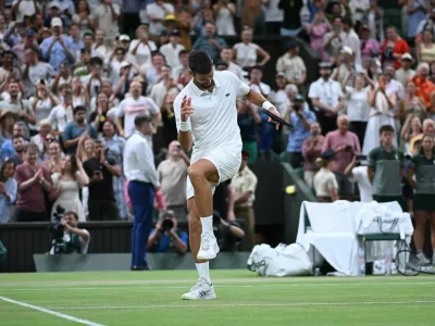 Tennis - Wimbledon - All England Lawn Tennis and Croquet Club, London, Britain - July 7, 2026 Serbia's Novak Djokovic celebrates after winning his quarter final match against Canada's Felix Auger-Aliassime REUTERS/Jaimi Joy