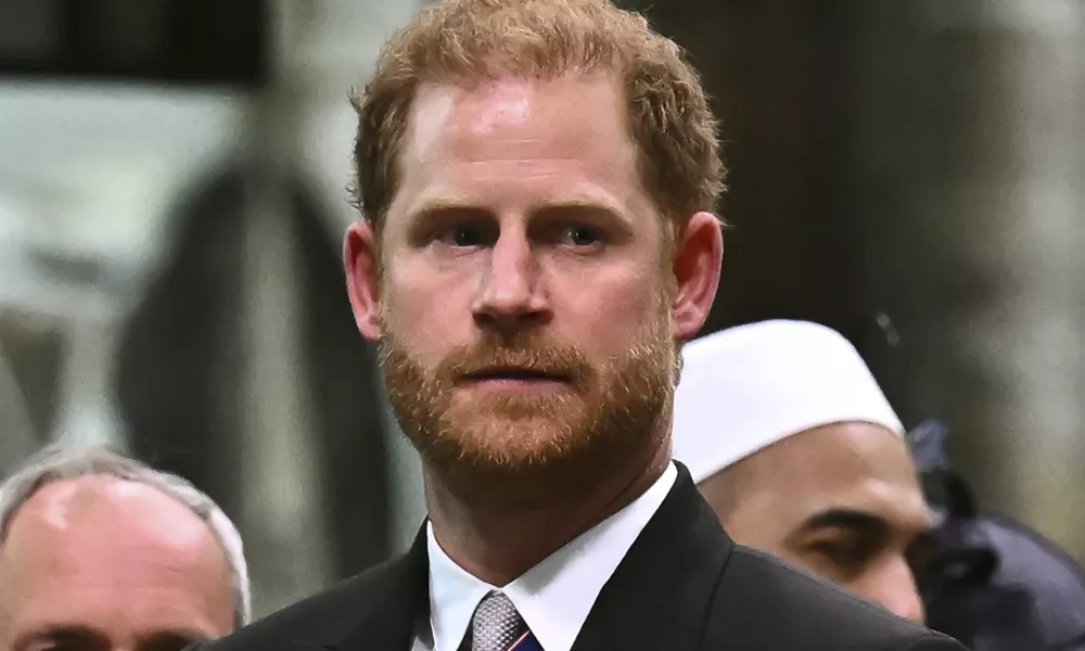 FILE - Britain's Prince Harry, Duke of Sussex looks on as Britain's King Charles III leaves Westminster Abbey after coronation in central London Saturday, May 6, 2023. Prince Harry has spoken to King Charles III about his cancer diagnosis and "will be traveling to the U.K. to see His Majesty in the coming days," said the office of Harry and his wife, Meghan. (Ben Stansall/Pool photo via AP, File)