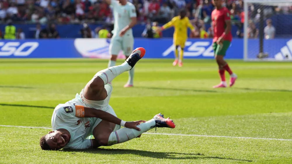 France's Kylian Mbappe (10) reacts to being tripped during the World Cup quarterfinal soccer match between France and Morocco in Foxborough, Mass., near Boston, Thursday, July 9, 2026. (AP Photo/Stephanie Scarbrough)
