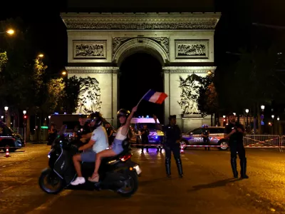 Soccer Football - FIFA World Cup 2026 - Quarter Final - France v Morocco - Fans gather in Paris - Paris, France - July 9, 2026 France fans celebrate at Champs-Elysees after the match REUTERS/Abdul Saboor
